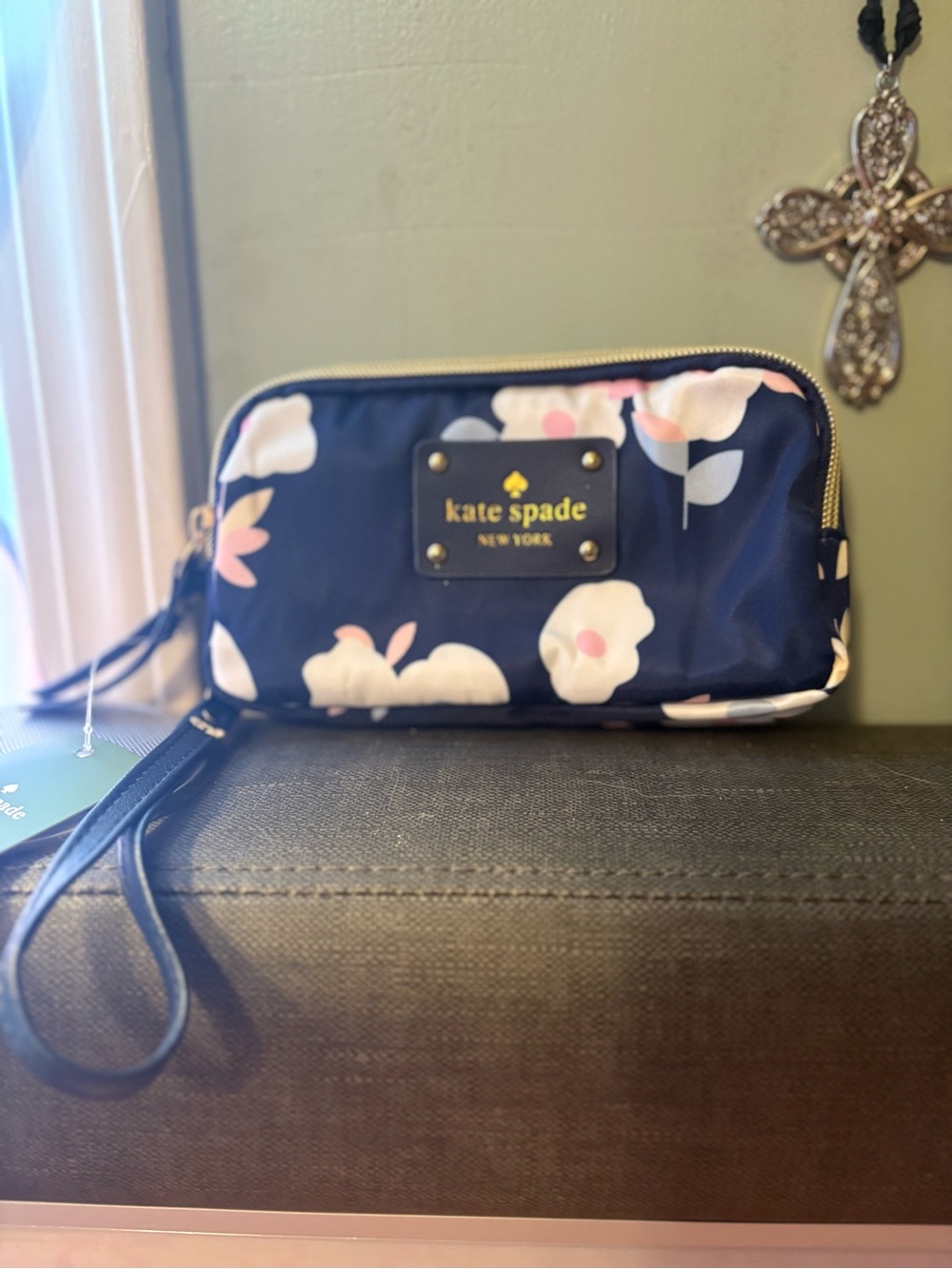 kate spade navy floral wristlet with blush and cream blooms